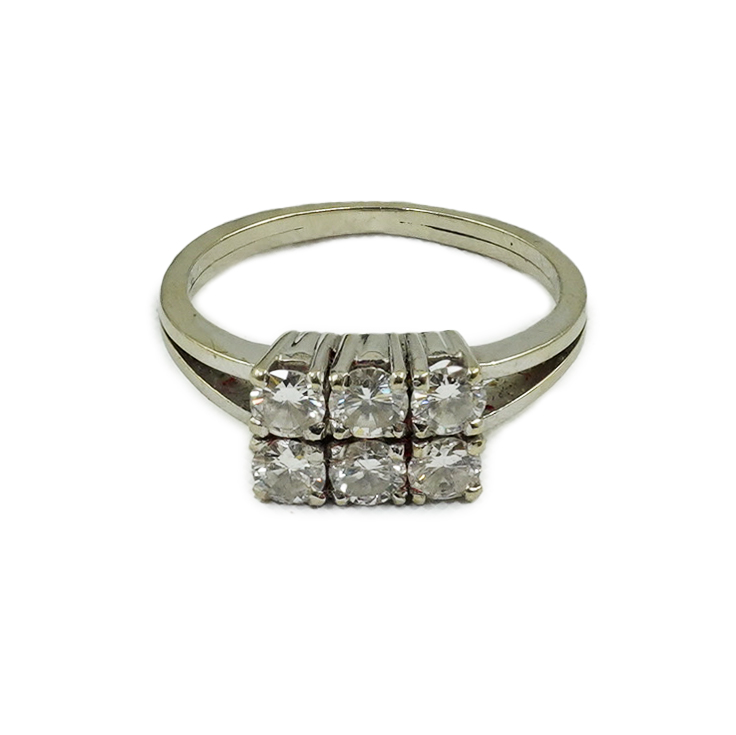 A white gold and six stone diamond cluster ring